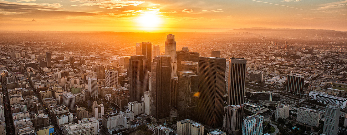 Picture of Los Angeles from overhead during sunrise.